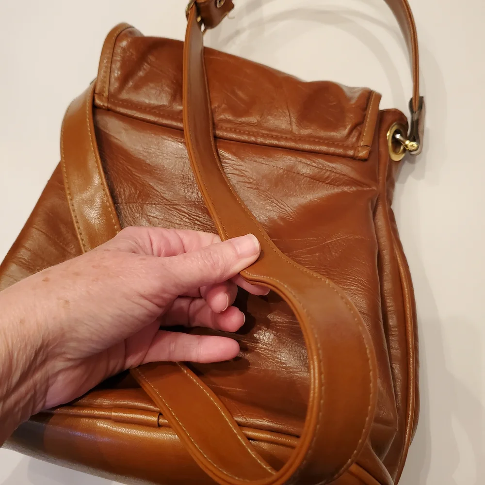 Vintage Capezio Cognac Bucket Crossbody Bag – Classic Gold Medallion